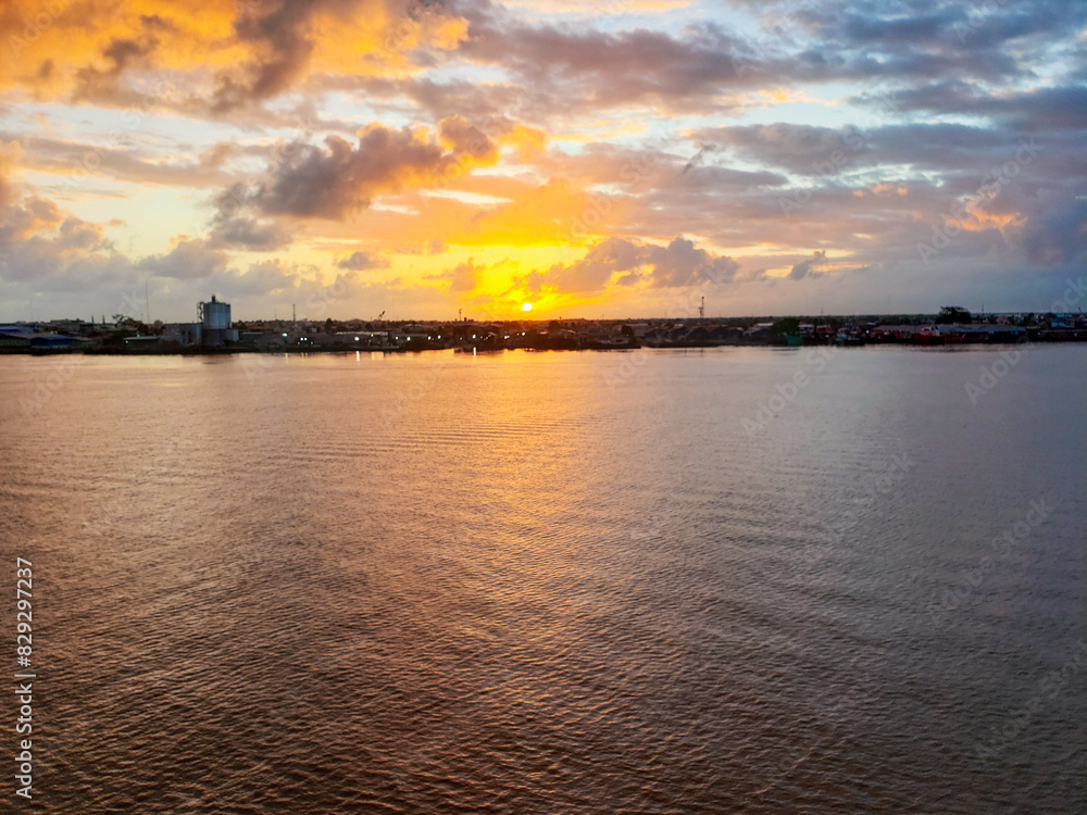 Sunset over the river Sunset over the river