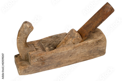 An antique wooden planer isolated on a white background. Close-up of an old planer.