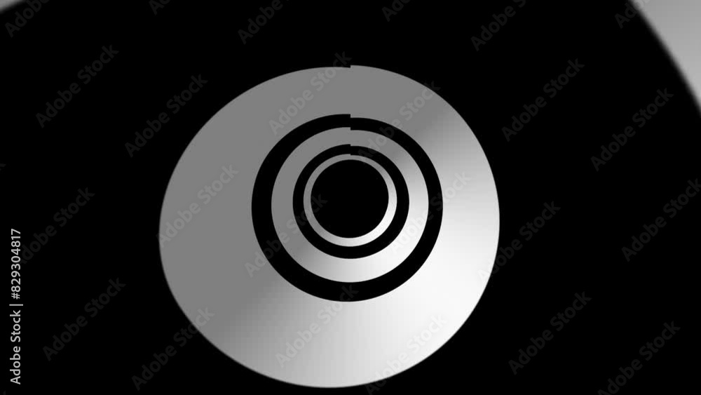 Optical art black and white animation of a group of circles spinning in place off-center. Seamless loop. Optical art black and white animation of a group of circles spinning in place off-center. Seamless loop.