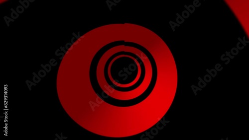 Optical art red and black animation of a group of circles spinning in place off-center. Seamless loop