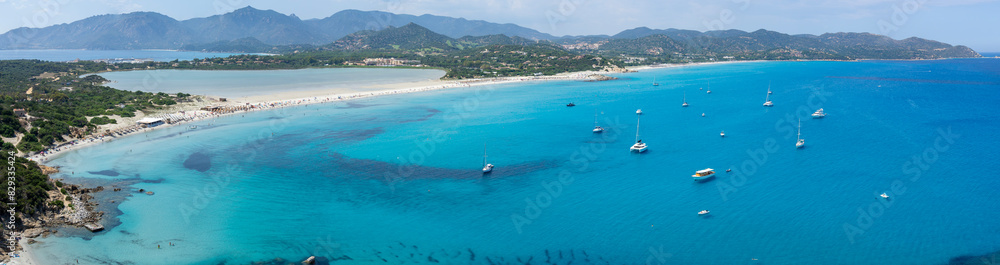 Fototapeta premium Villasimus, Sardegna. Amazing aerial view of the bay of the beach Porto Giunco, Time Ama, Serr'e Morus. Sea of Sardinia one of the most beautiful in Italy. Summer time