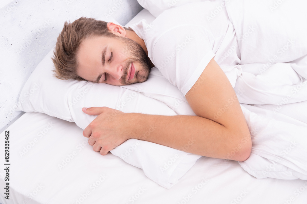 © be free - Deep male sleep. Man sleeping at night. Sleepy man lying on bed sleeping at white bedroom. Asleep young man sleeping. Resting peacefully in comfortable bed. Lying with closed eyes. Sick leave © be free - Deep male sleep. Man sleeping at night. Sleepy man lying on bed sleeping at white bedroom. Asleep young man sleeping. Resting peacefully in comfortable bed. Lying with closed eyes. Sick leave