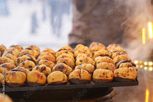 traditional Istanbul street food grilled chestnuts in a row © Towfiqu Barbhuiya 
