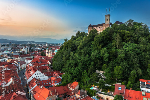 Ljubljana, Slovenia - Aerial cityscape view of Ljubljana castle and hill on a summer afternoon with Franciscan Church of the Annunciation, Ljubljana Cathedral and skyline of the capital of Slovenia