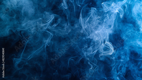 Swirling elegance of midnight blue smoke in atmospheric designs. © Ilyas