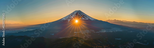 The top of the mountain sun and mount in blur background  sunset illuminates mountains photo