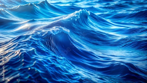 Fototapeta Naklejka Na Ścianę i Meble -  Ocean Wave Blur: A blue, wavy blurred background that captures the essence of the ocean and water.
