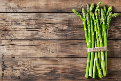 perfect asparagus isolated on wooden background 