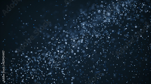 A dark background with tiny white dots forming a snowflake pattern.