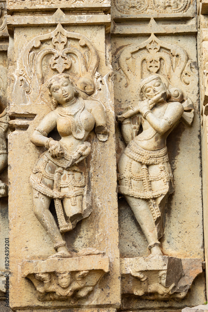 Sculpture of Lord Krishna and Dancing Women on the Kedareshwara Temple, Dharmapuri, Beed Maharashtra India. Sculpture of Lord Krishna and Dancing Women on the Kedareshwara Temple, Dharmapuri, Beed Maharashtra India.