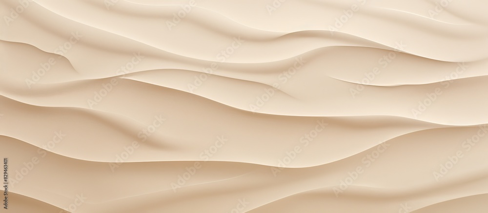 The sand beige textured background features an abstract patterned wall providing ample copy space for creative use The sand beige textured background features an abstract patterned wall providing ample copy space for creative use