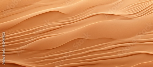Close up view of sand with a visually captivating pattern providing plenty of copy space for additional elements in the image