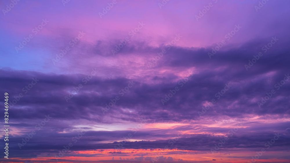 A breathtaking sunrise with a palette of deep purples and pinks. The vibrant colors fill the sky, blending beautifully and creating a tranquil and captivating scene. Cloud background.
A breathtaking sunrise with a palette of deep purples and pinks. The vibrant colors fill the sky, blending beautifully and creating a tranquil and captivating scene. Cloud background.