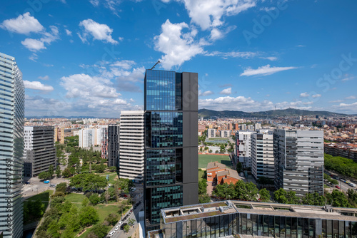 This Barcelona skyline in Hospitalet de Llobregat captures the essence of contemporary urban life, with eclectic buildings, and Plaza Europa in Catalonia, Spain photo