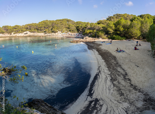 Cala Turqueta a beach with restricted access for tourist control in the south of the island of Menorca, early in the morning in the Balearic Islands