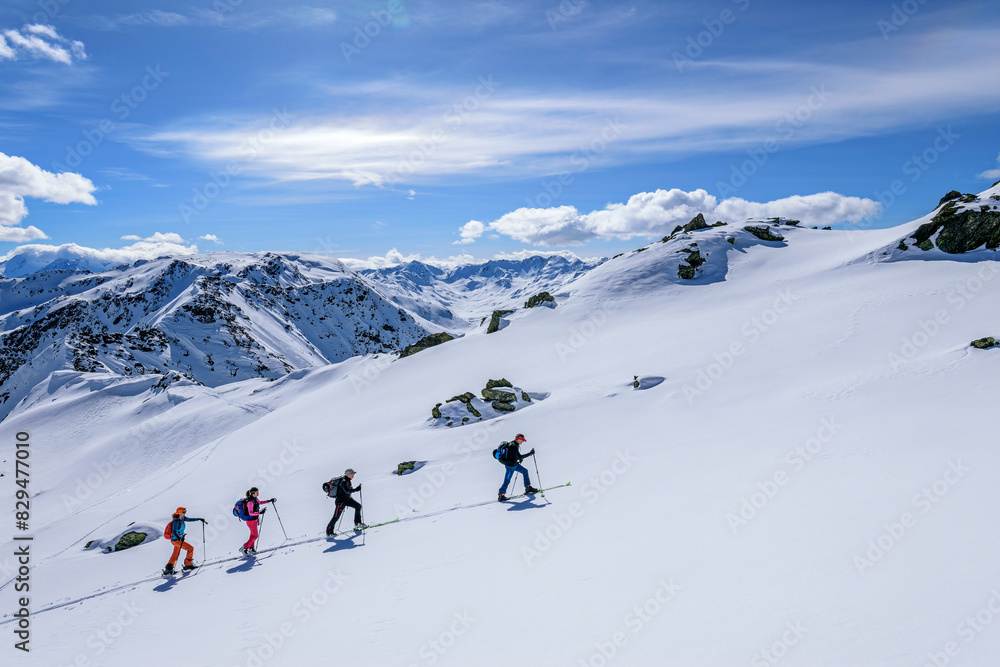 Men and women back country skiing at Gressenstein, Inneralpbach, Kitzbuehel Alps, Tyrol, Austria Men and women back country skiing at Gressenstein, Inneralpbach, Kitzbuehel Alps, Tyrol, Austria