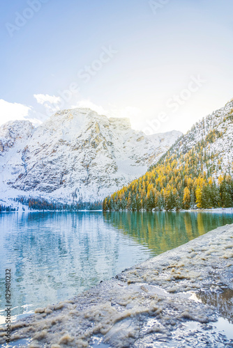 Lakeshore of Pragser Wildsee lake with mountains in Trentino Alto Adige, Italy