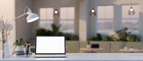 A white-screen laptop computer mockup on a table in a contemporary coffee shop or restaurant.