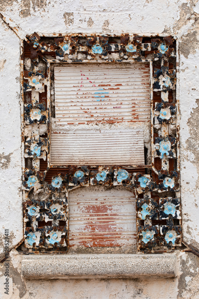 Naklejka premium Decayed Ticket Window of Abandoned Movie Theatre in Oropesa del Mar, Spain