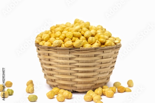 Roasted Garbanzo Bean or Chickpea in a Bamboo Basket Isolated on White Background with Copy Space, Also Known as Bengal Gram or Egyptian Pea in Horizontal Orientation