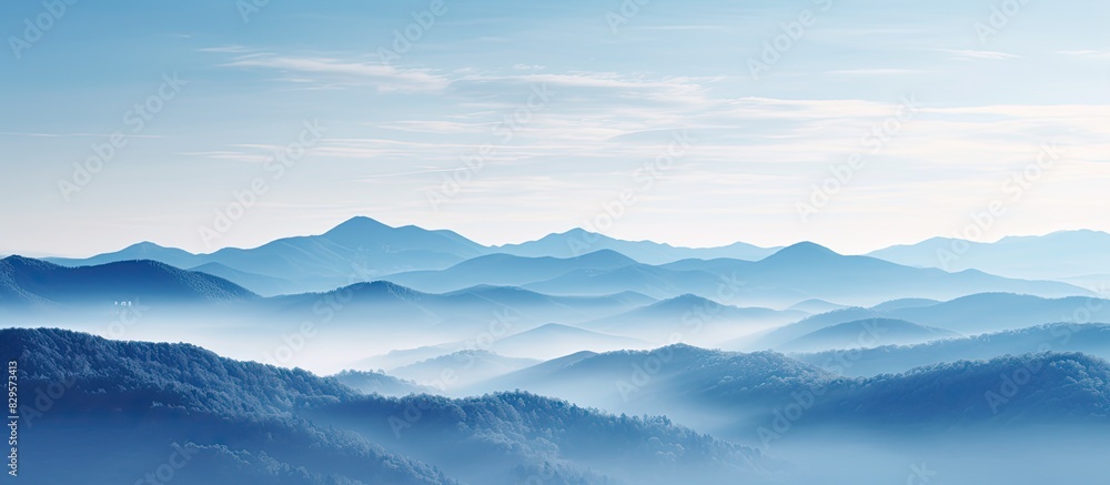 Scenic mountain landscape with misty sky and stunning views perfect for a copy space image Scenic mountain landscape with misty sky and stunning views perfect for a copy space image