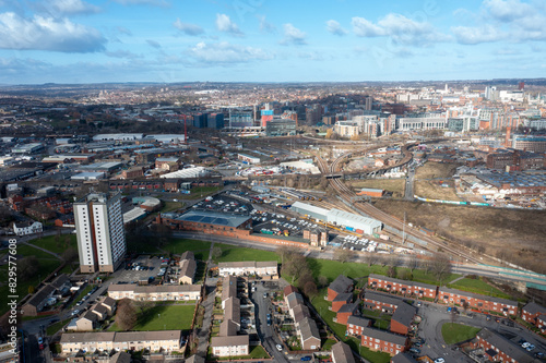 Aerial photo of the British town of Leeds in West Yorkshire UK, showing the Leeds City Centre taken with with a drone on a bright sunny day in the town of Holbeck near to the centre. © Duncan