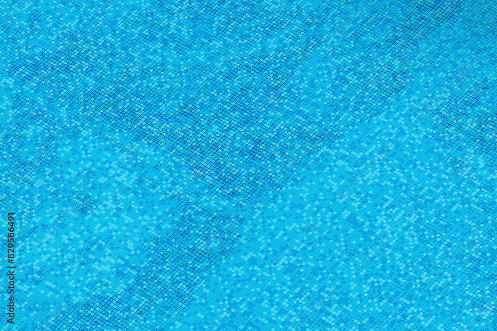 High angle view of clean swimming pool water with blue ceramic tiles at the bottom High angle view of clean swimming pool water with blue ceramic tiles at the bottom