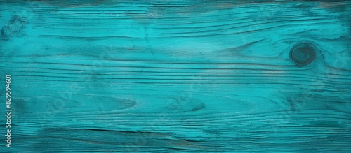 Background texture of wood painted in teal or turquoise green with copy space image photo