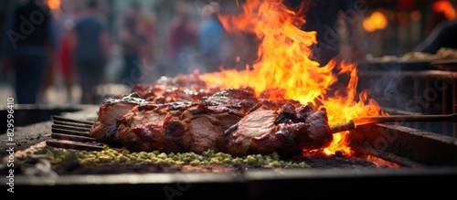 East European food concept at a food festival showcasing Market street food with a large pork piece cooked over open fire ideal for a copy space image