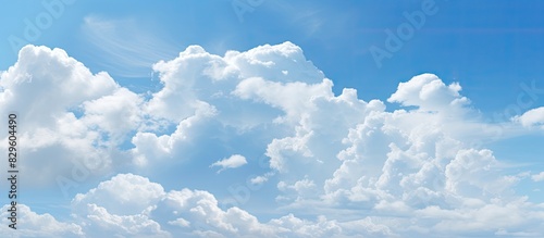 Scenic sky with various cloud formations like cirrostratus cirrocumulus and cumulus on a sunny afternoon providing a picturesque backdrop Includes copy space image photo