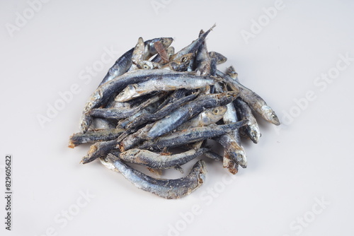 salted anchovies on a white background with studio lighting, in Indonesia is called 
