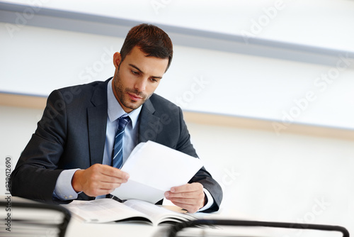 Business man, reading and paperwork for financial accounting, expenses and budget report in office. Corporate worker, accountant or auditor with documents for bookkeeping of company taxes or revenue