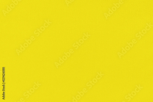 Yellow canvas texture, bright yellow fabric texture as background 