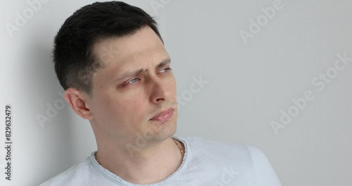Caucasian sad upset man on light background photo