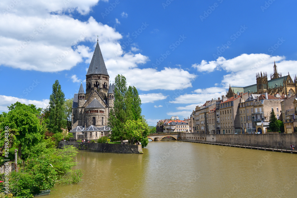 Fototapeta premium Metz, France. Temple Neuf (New Temple) as seen from the banks of the Moselle River. May 9, 2024.