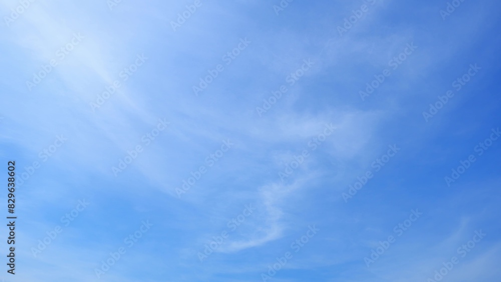A serene blue sky with a few soft, wispy clouds dispersed throughout. The gentle clouds add a sense of calm and tranquility to the bright and clear sky. Cloud background.
A serene blue sky with a few soft, wispy clouds dispersed throughout. The gentle clouds add a sense of calm and tranquility to the bright and clear sky. Cloud background.