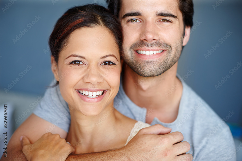 Hug, portrait and romance with couple in bedroom of home together for bonding, marriage or support. Face, love or trust with smile of man and woman embracing in apartment for weekend time off Hug, portrait and romance with couple in bedroom of home together for bonding, marriage or support. Face, love or trust with smile of man and woman embracing in apartment for weekend time off