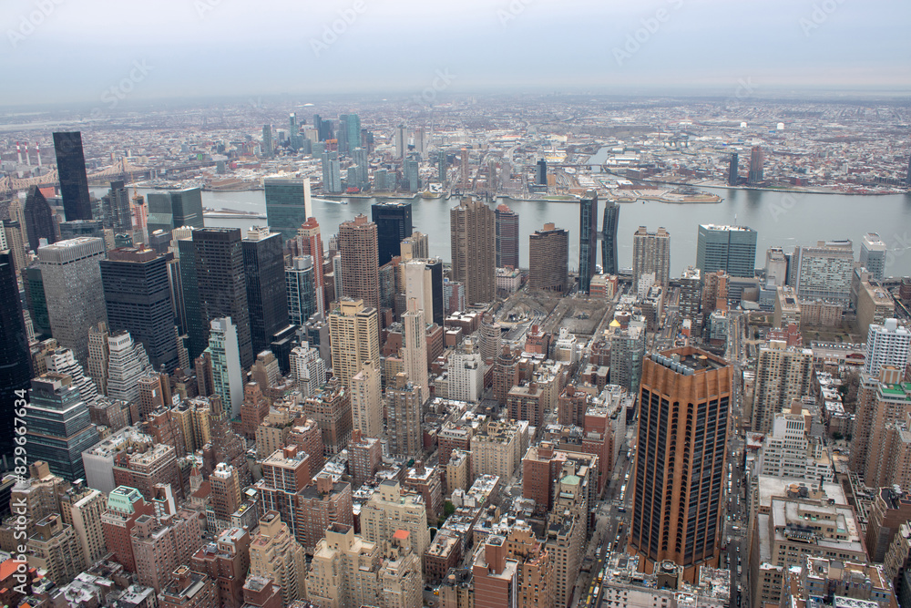 Aerial view of Manhattan in New York City showing the classic high rise buildings and city scape in the USA