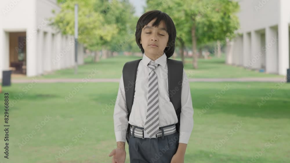 Confused Indian school boy asking what question Confused Indian school boy asking what question