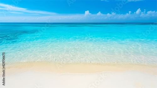  Sand beach with blue water of sea with blue sky