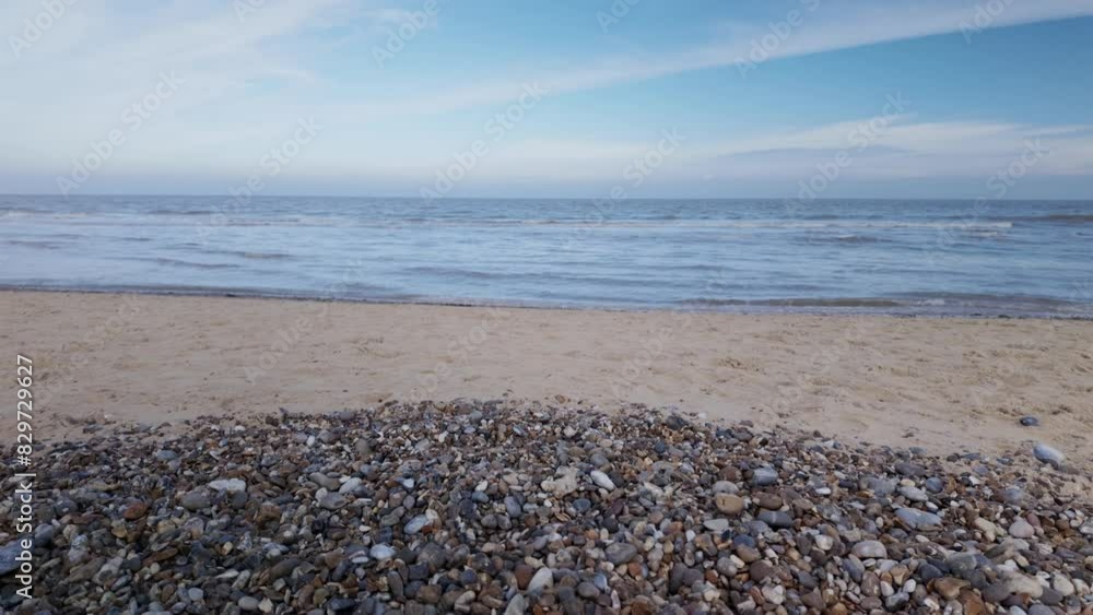 Deserted Sea sand and sky with pebble beach Southwold,Suffolk UK Deserted Sea sand and sky with pebble beach Southwold,Suffolk UK