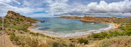 Panoramic view over the Golden Bay and beach (Ghajn Tuffieha) with turquoise, azure sea, Malta travel destination. photo