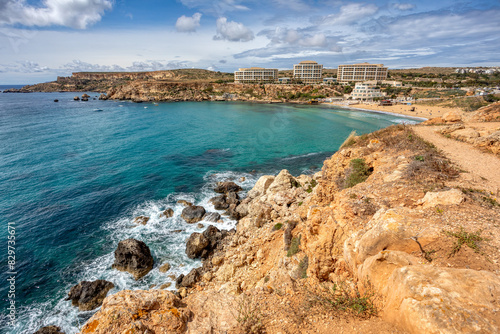 Panoramic view over the Golden Bay and beach (Ghajn Tuffieha) with turquoise, azure sea, Malta travel destination. photo