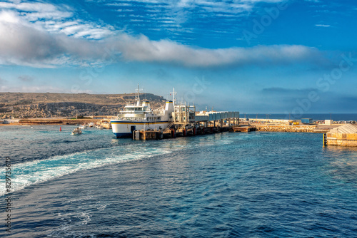 Konstfotografi Malta to Gozo, Passengers board modern ferry at Cirkewwa Passenger terminal for scenic cruise to idyllic Gozo Island