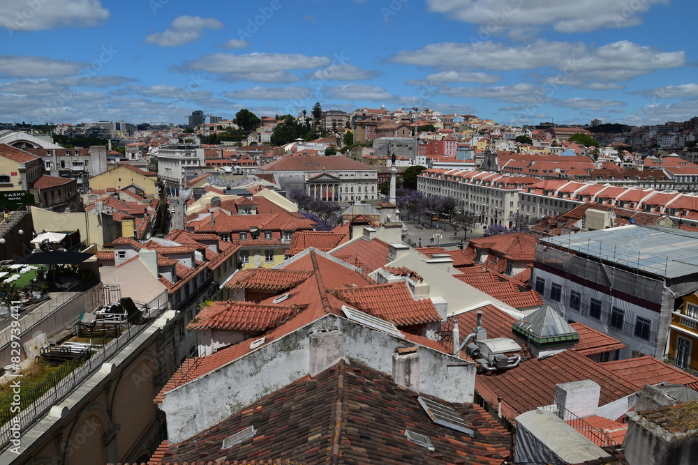 Aerial view of buildings and landmarks in Lisbon Portugal with incredible architecture and a blue sky background. Aerial view of buildings and landmarks in Lisbon Portugal with incredible architecture and a blue sky background.