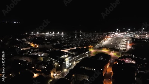 High night drone footage over St Julians Avenue, North Beach ,QEII Marina and ferry terminal St Peter Port Guernsey photo