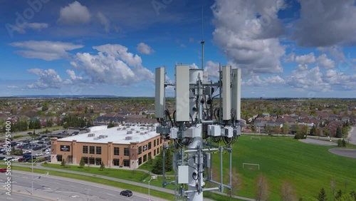 Wallpaper Mural Drone shot of an orbit around a white cell phone tower. Torontodigital.ca