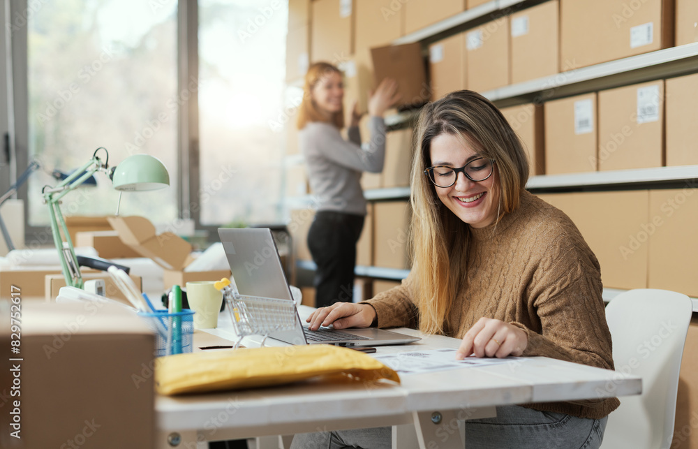 Professional e-commerce employees working together Professional e-commerce employees working together