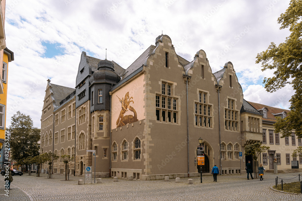 Fototapeta premium Vintage brown building against a cloudy sky