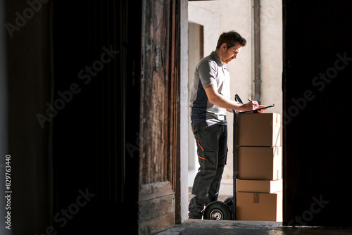 Delivery man working and delivering boxes